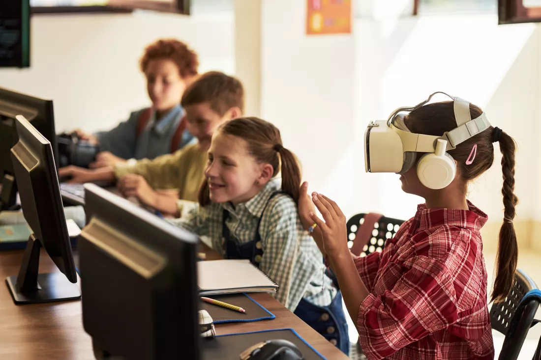 preteen-caucasian-girl-using-virtual-reality-headset-classroom-setting